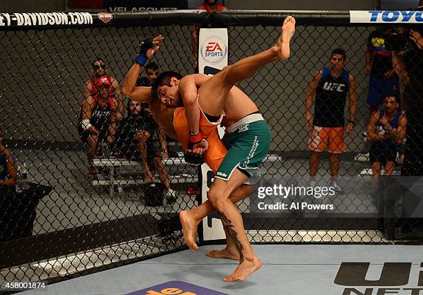 Team Velasquez fighter Gabriel Benitez takes down team Werdum fighter Leonardo Morales in their semifinal fight during filming of The Ultimate...