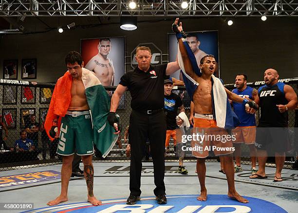 Team Werdum fighter Leonardo Morales celebrates his victory over team Velasquez fighter Gabriel Benitez after their semifinal fight during filming of...