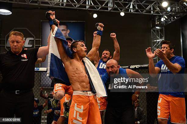 Team Werdum fighter Leonardo Morales celebrates his victory over team Velasquez fighter Gabriel Benitez after their semifinal fight during filming of...