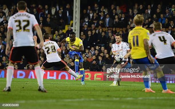 Simon Dawkins of Derby County scores his goal during the Capital One Cup fourth round match between Fulham Derby County at Craven Cottage on October...