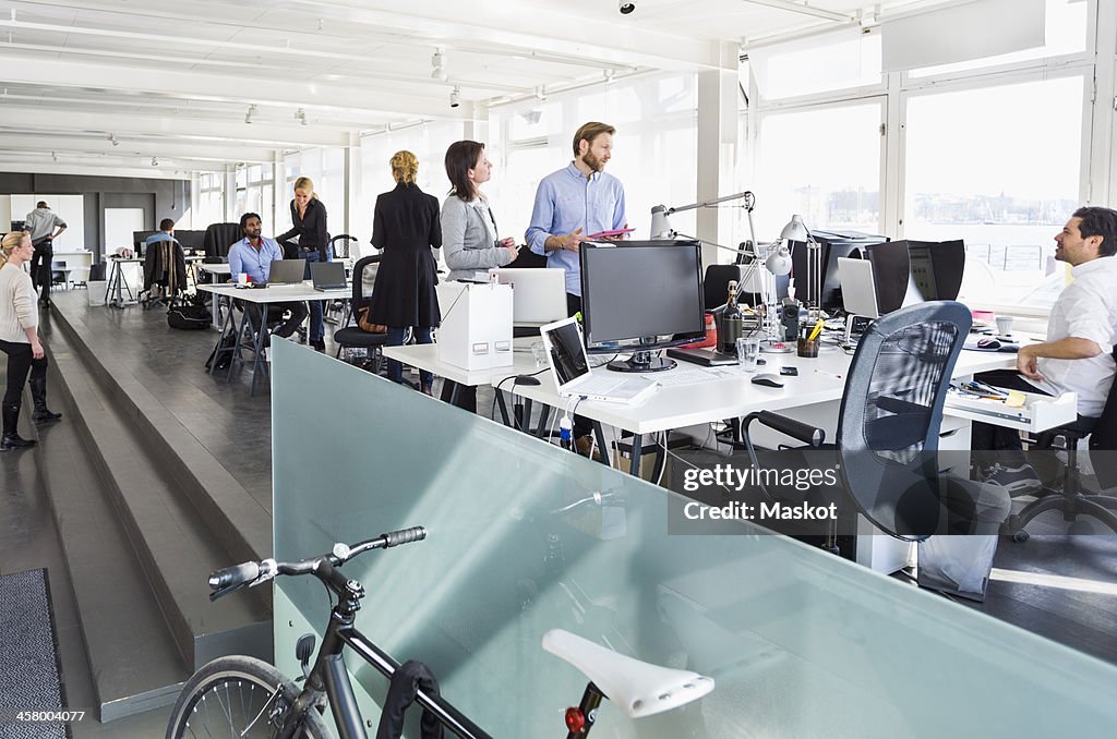 Business colleagues working in office