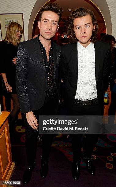 Nick Grimshaw and Harry Styles attend the launch of Annabel's Docu-Film "A String of Naked Lightbulbs" at Annabel's on October 28, 2014 in London,...