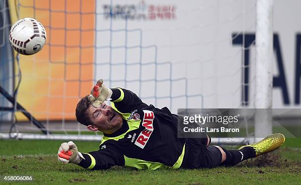 Timo Horn of Koeln saves one of two penalties during the DFB Cup second round match between MSV Duisburg and 1. FC Koeln at Schauinsland-Reisen-Arena...