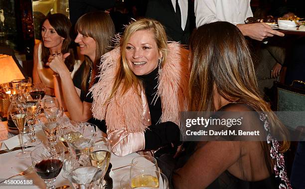 Kate Moss attends the launch of Annabel's Docu-Film "A String of Naked Lightbulbs" at Annabel's on October 28, 2014 in London, England.