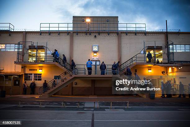 Prisoners wait in line for breakfast at California Men's Colony prison on December 19, 2013 in San Luis Obispo, California. As of June 2013, the...