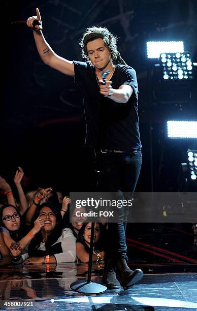 Harry Styles of 'One Direction' performs onstage on FOX's "The X Factor" Season 3 Live Finale on December 19, 2013 in Hollywood, California.