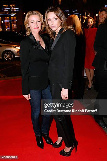 Actresses Astrid Whettnall and Laura Smet attend the 'Yves Saint Laurent' Paris movie Premiere at Cinema UGC Normandie on December 19, 2013 in Paris,...