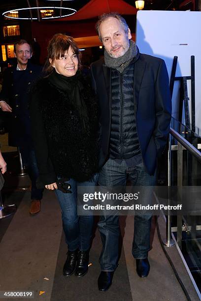 Hippolyte Girardot and his wife attend the 'Yves Saint Laurent' Paris movie Premiere at Cinema UGC Normandie on December 19, 2013 in Paris, France.