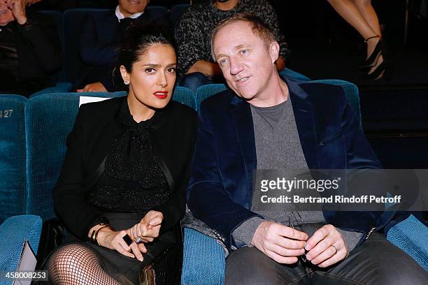 Actress Salma Hayek and Francois-Henri Pinault attend the 'Yves Saint Laurent' Paris movie Premiere at Cinema UGC Normandie on December 19, 2013 in...