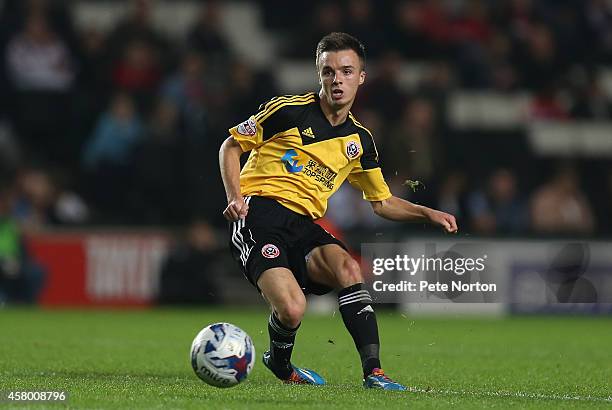 Stefan Scougall of Sheffield United in action during the Capital One Cup Fourth Round match between MK Dons and Sheffield United at Stadium mk on...