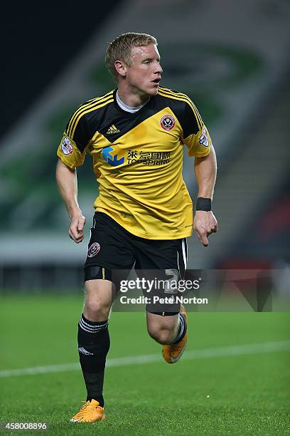 Craig Alcock of Sheffield United in action during the Capital One Cup Fourth Round match between MK Dons and Sheffield United at Stadium mk on...