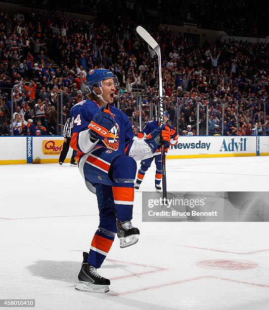 Mikhail Grabovski of the New York Islanders celebrates his shorthanded goal at 15:52 of the second period against the Winnipeg Jets at the Nassau...