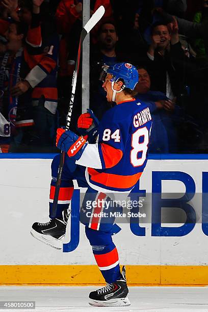 Mikhail Grabovski of the New York Islanders celebrates his second period goal against the Winnipeg Jets at Nassau Veterans Memorial Coliseum on...