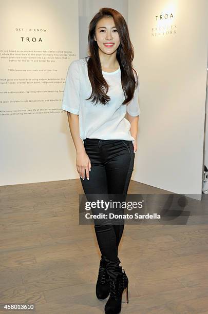Actress Ji-Won Ha attends the TROA denim event at Barneys in Los Angeles on October 28, 2014 in Los Angeles, California.