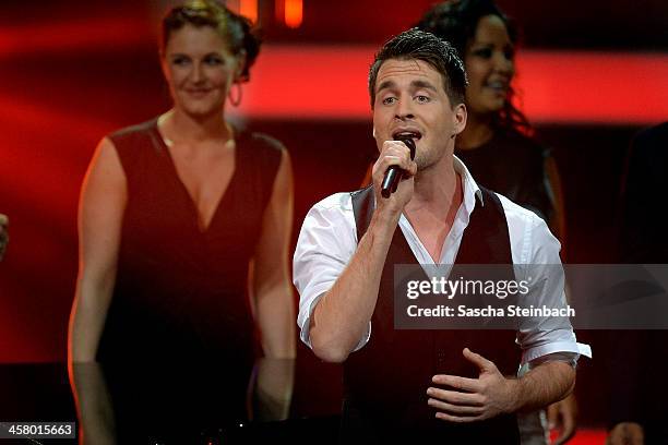 Singer Alexander Klaws performs during the taping of the anniversary show '30 Jahre RTL - Die grosse Jubilaeumsshow mit Thomas Gottschalk' on...