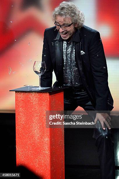 Presenter Thomas Gottschalk brings a glass to shatter during the taping of the anniversary show '30 Jahre RTL - Die grosse Jubilaeumsshow mit Thomas...