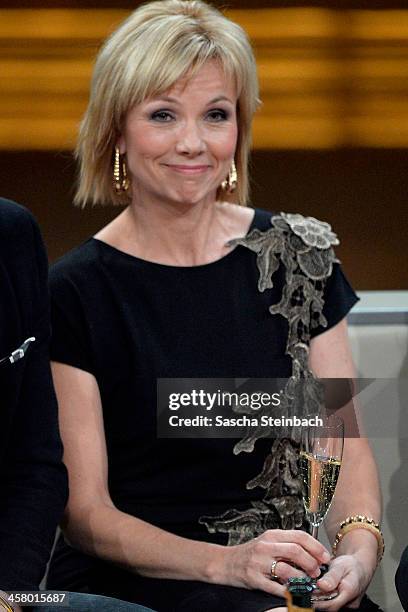 Presenter Ilka Essmueller looks on during the taping of the anniversary show '30 Jahre RTL - Die grosse Jubilaeumsshow mit Thomas Gottschalk' on...