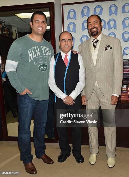 Former Jets player Anthony Becht, Mohan Ramchandani and former basketball player Walt "Clyde" Frasier attend the 2013 Mohan's Winter Coat Drive...