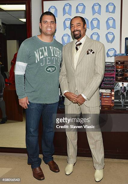 Former Jets player Anthony Becht and former basketball player Walt "Clyde" Frasier attend the 2013 Mohan's Winter Coat Drive benefiting The Doe Fund...