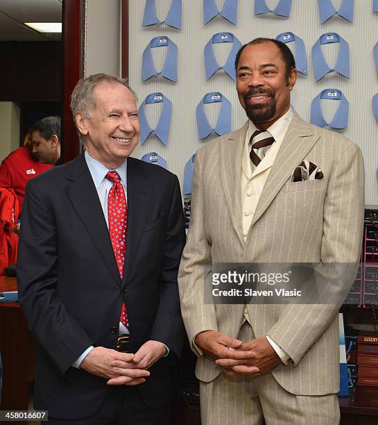 Doe Fund founder George McDonald and former basketball player Walt "Clyde" Frasier attend the 2013 Mohan's Winter Coat Drive benefiting The Doe Fund...