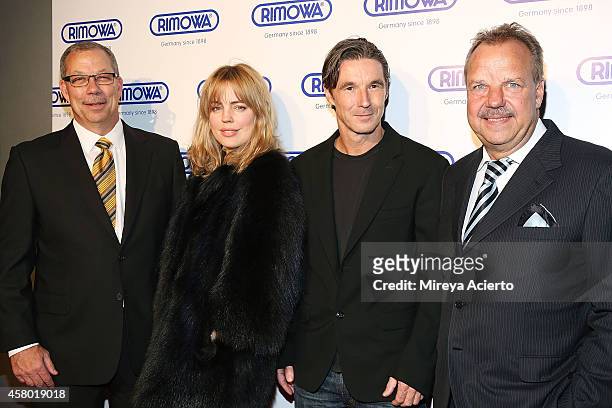Tom Nelson, Melissa George, Neville Wakefield and Dieter Morszeck attend Rimowa NYC Store Grand Opening at Rimowa on October 28, 2014 in New York...