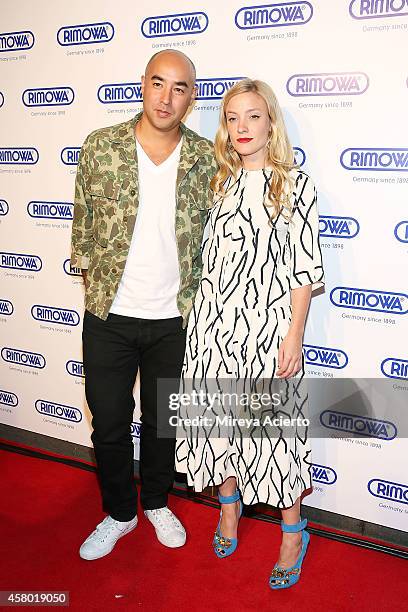 Max Osterweis and Kate Foley attend Rimowa NYC Store Grand Opening at Rimowa on October 28, 2014 in New York City.