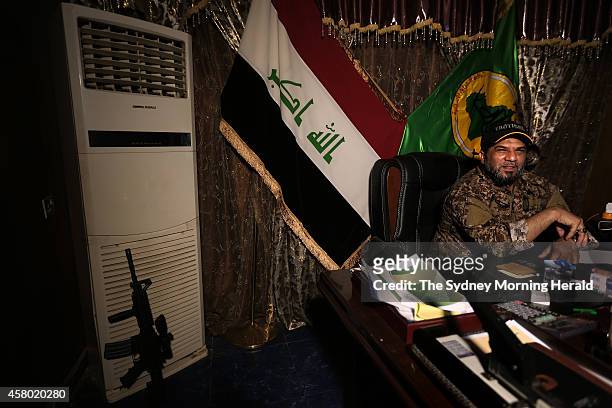Haji Jaffer Al-Bindawi is the Logistics, Training and Development Chief at the Imam Ali Brigade headquarters in Baghdad, Iraq, October 19, 2014. The...