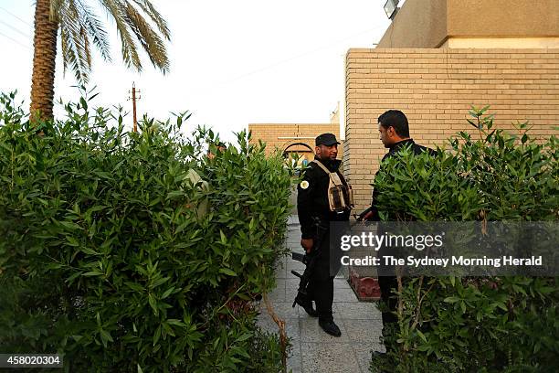 Members of the Imam Ali Brigade provide security at their headquarters in Baghdad, Iraq, October 19, 2014. The Shiite militia group is opposed to the...