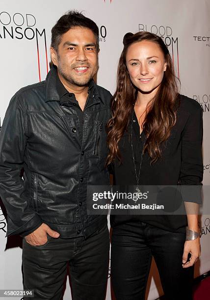 Director Francis dela Torre and actress Briana Evigan attend the Los Angeles Premiere Of "Blood Ransom" on October 28, 2014 in Los Angeles,...