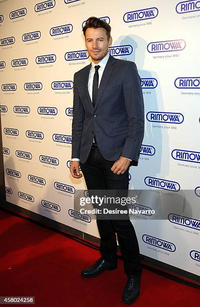 Model Alex Lundqvist attends Rimowa NYC Store Grand Opening at Rimowa on October 28, 2014 in New York City.