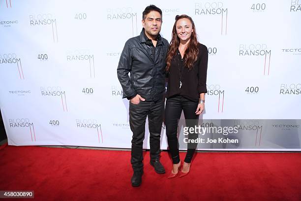 Director Francis dela Torre and Briana Evigan attends "Blood Ransom" Los Angeles Premiere at ArcLight Hollywood on October 28, 2014 in Hollywood,...