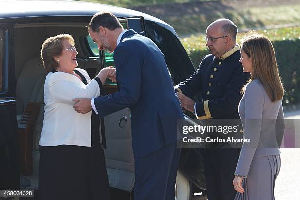 King Felipe VI of Spain and Queen Letizia of Spain receive Chilean President Michelle Bachelet at the El Pardo Palace on October 29, 2014 in Madrid,...