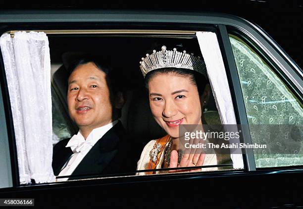 Crown Prince Naruhito and Crown Princess Masako are seen upon arrival at the Imperial Palace to attend the state dinner for King Willem-Alexander and...