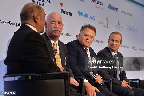 Left-Right: Fereidun Fesharaki, Albert Helmig, Christopher Blake and Pierre Andurand appear on stage on Day 1 at the International New York...