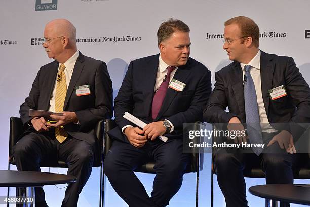 Left-Right: Albert Helmig, Christopher Blake and Pierre Andurand appear on stage on Day 1 at the International New York Times/Energy Intelligence Oil...