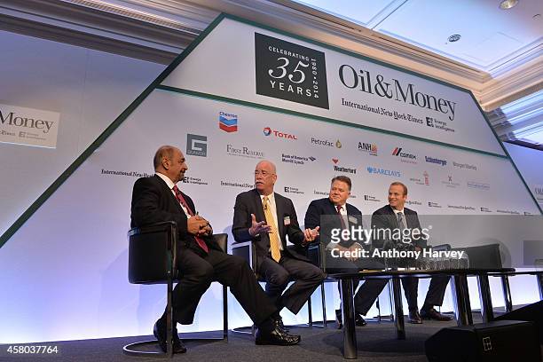 Left-Right: Fereidun Fesharaki, Albert Helmig, Christopher Blake and Pierre Andurand appear on stage on Day 1 at the International New York...
