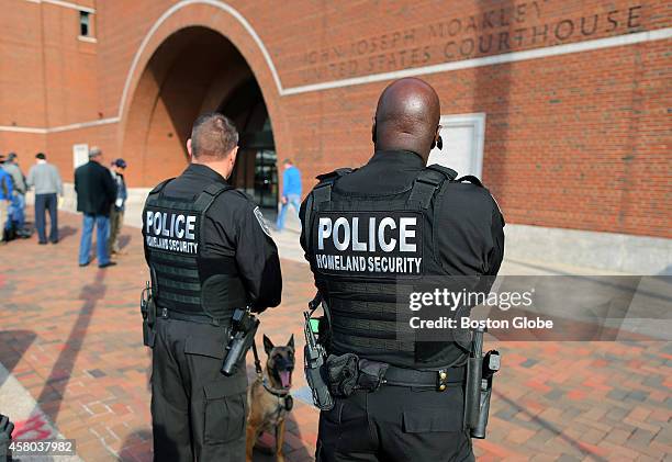 At Moakley Federal Court in Boston, Homeland Security officers stand guard as a guilty verdict was given to Robel Phillipos, a friend of the Boston...