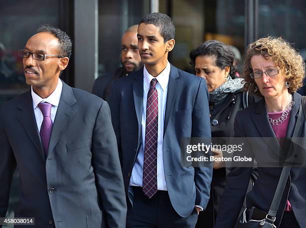 Robel Phillipos, friend of the Boston Marathon bomber, walks from the Moakley Federal Court in Boston to a waiting car with his attorneys Derege...
