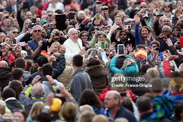 Pope Francis attends the general audience in St. Peter's square on October 29, 2014 in Vatican City, Vatican. At his General Audience on Wednesday,...