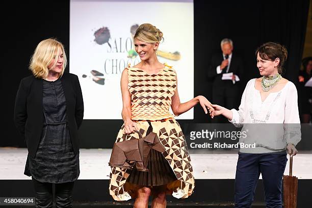 Members of Rozsavolgyi Chocolate and Helene Gateau walk the runway during the Fashion Chocolate show at Salon du Chocolat at Parc des Expositions...