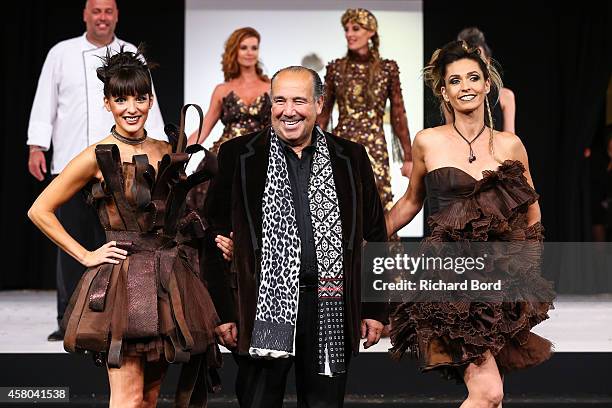 Erika Moulet, stylist Max Chaoul and Adeline Blondieau walk the runway during the Fashion Chocolate show at Salon du Chocolat at Parc des Expositions...