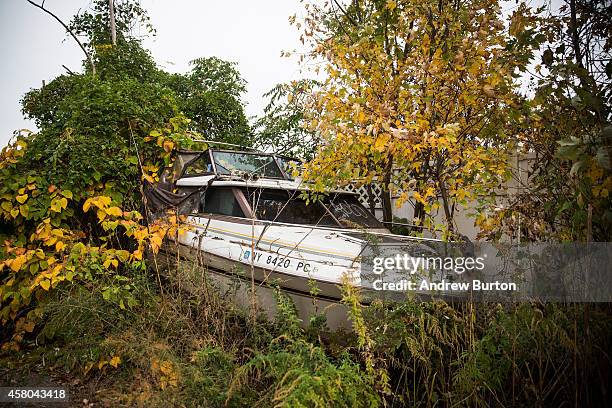 Boat sits abandoned on the side of a road two years after Superstorm Sandy landed on October 29, 2014 in the Graham Beach neighborhood of the Staten...