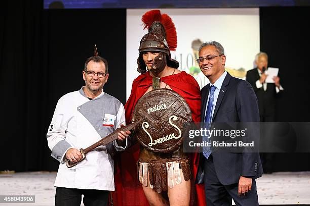 Chocolate maker Jean-Luc Decluzeau and Clement Becq walk the runway during the Fashion Chocolate show at Salon du Chocolat at Parc des Expositions...