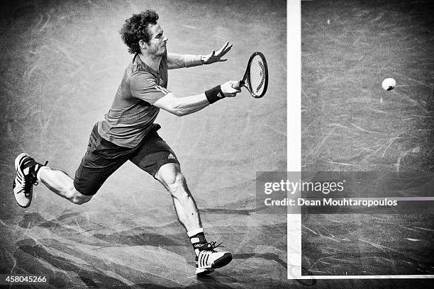 Andy Murray of Great Britain in action against Julien Benneteau of France during day 3 of the BNP Paribas Masters held at the at Palais Omnisports de...