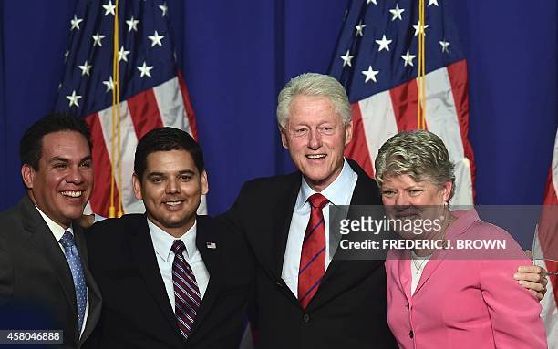 Former US President Bill Clinton poses with California politicians, Pete Aguilar Mayor of Redlands, Congressman Raul Ruiz and Congresswoman Julia...