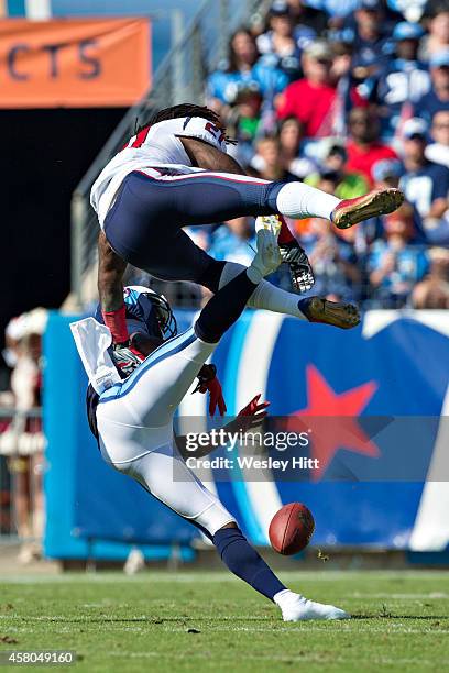 Kendrick Lewis of the Houston Texans breaks up a pass thrown to Kendall Wright of the Tennessee Titans at LP Field on October 26, 2014 in Nashville,...