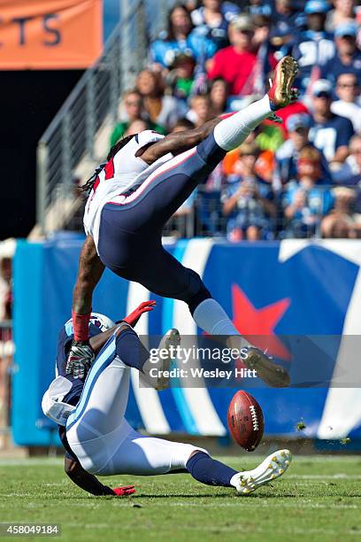 Kendrick Lewis of the Houston Texans breaks up a pass thrown to Kendall Wright of the Tennessee Titans at LP Field on October 26, 2014 in Nashville,...