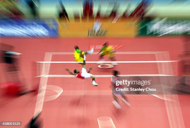 General view of the Men's Team Double Final of the Sepak Takraw Competition between Indonesia and Burma during the 2013 SEA Games at the Wunna...