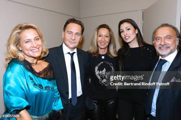 Eric Besson and his wife Yasmine Besson , Olivier Dassault and his wife Natacha Dassault and producer of the show Nicole Coullier pose backstage...