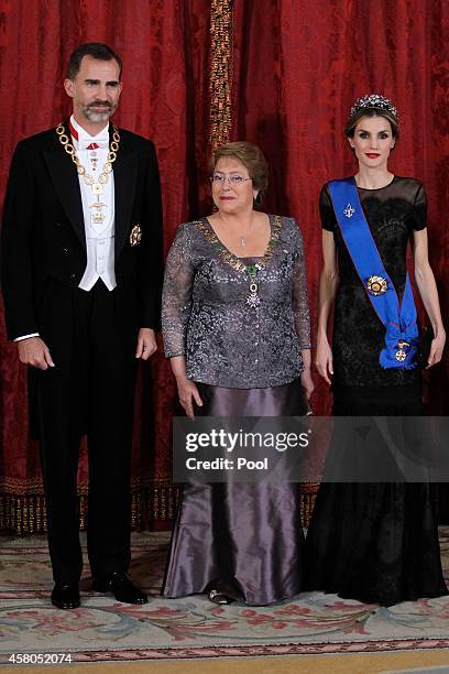 King Felipe VI of Spain and Queen Letizia of Spain receive Chilean President Michelle Bachelet for a Gala dinner at the Royal Palace on October 29,...